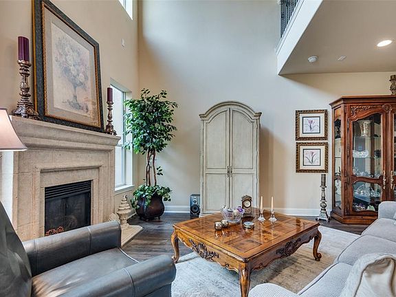 Living room is pre-wired with surround sound wiring and includes recessed lighting.