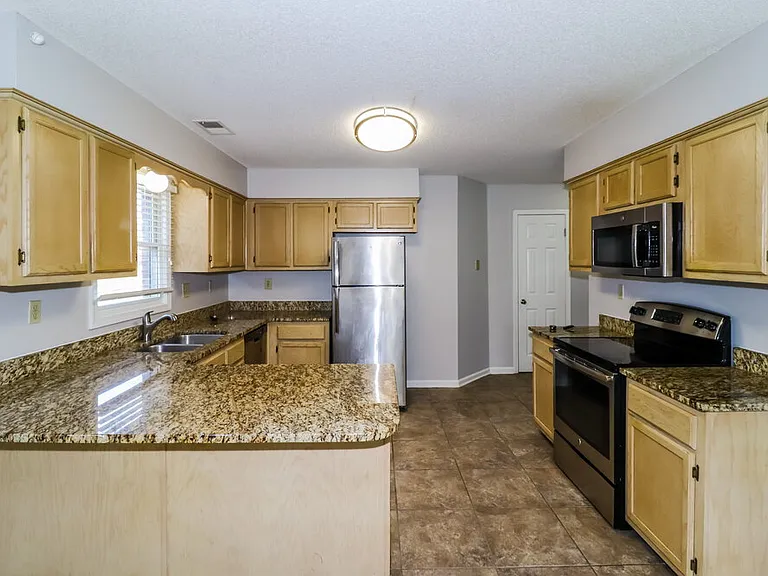 8815 Chimneyrock Blvd — Photo 10