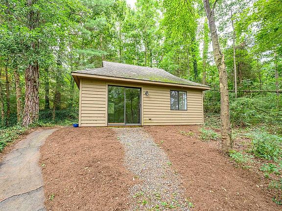 Sliding doors open onto your private yard space perfect for shady vegetation!