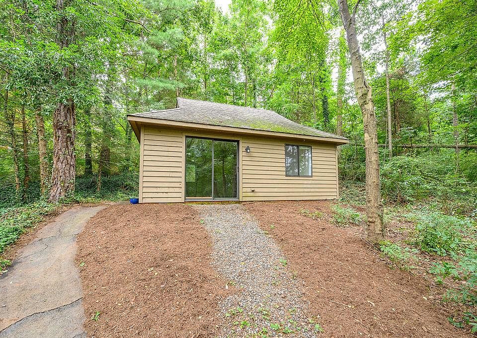 Sliding doors open onto your private yard space perfect for shady vegetation!