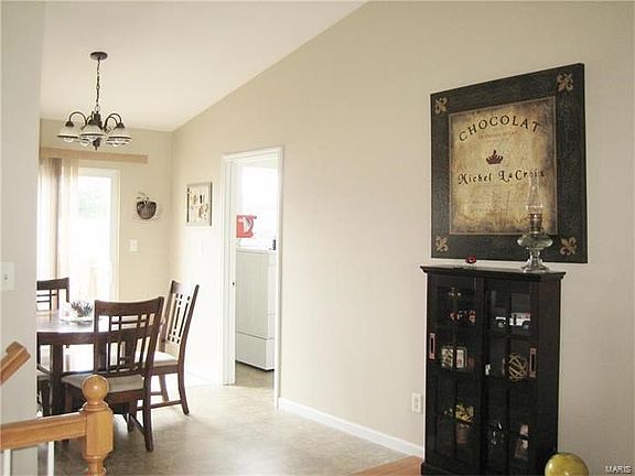 Great room opens to Breakfast room with slider to back deck & MFLaundry room with HUGE pantry!