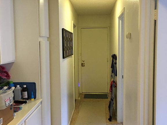 Hallway with linen closet
