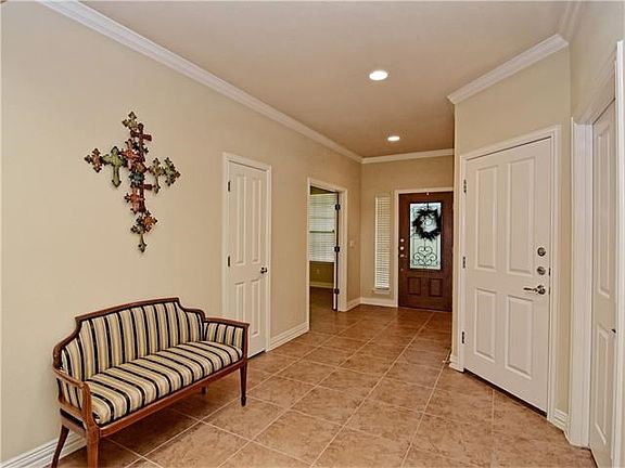 Garage is off the entry along with hall closet.