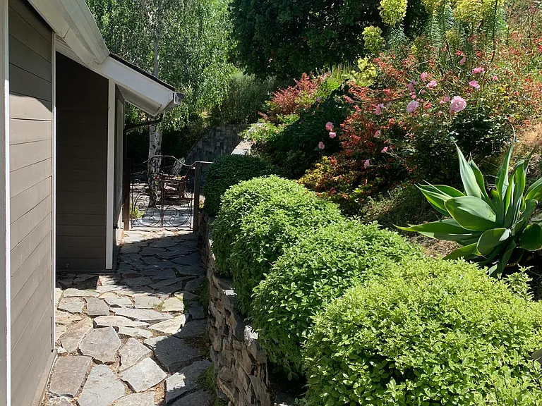 Path from front door to backyard patio