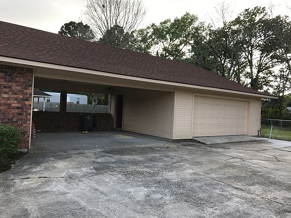 Car port and 2 car garage
