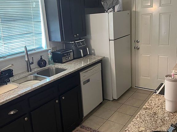 Kitchen with marble countertops