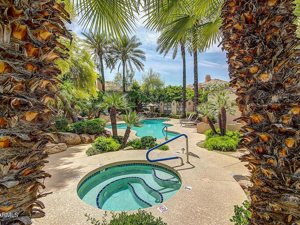 Steps to 1 of 2 heated pools and hot tubs