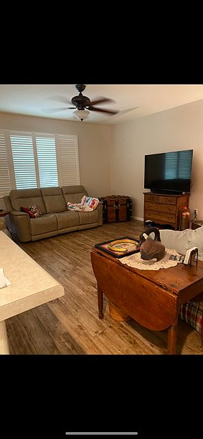 Wood look tile flooring - open living dining kitchen