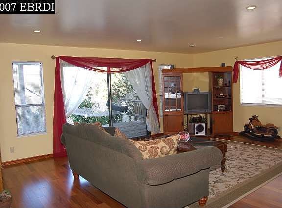 Spend quality time in the large family room featuring fabulous hardwood floors