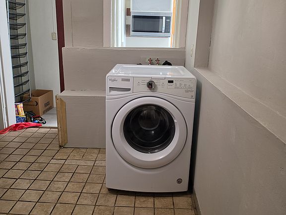 Front loader washer (non coin-op) on main floor in apartment