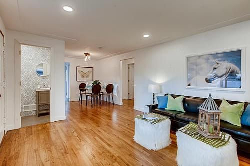 Spacious great room with living room and dining areas.