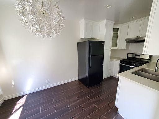 4th image of 8542 Saturn St #2