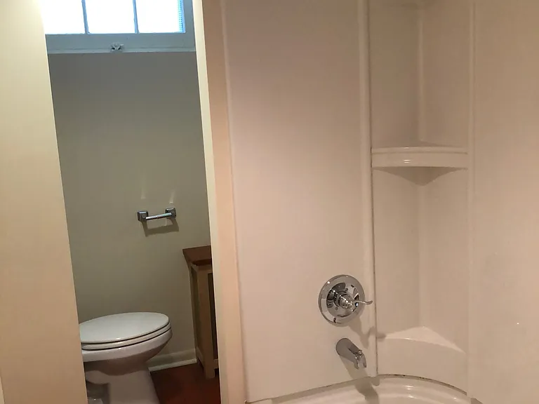 Bathroom with tub and shower. Extra large closet.