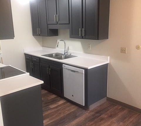 Remodeled Kitchen with New Floors, Countertops and Cabinets