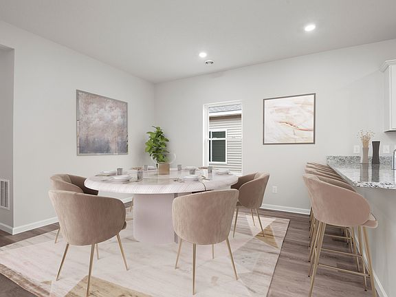The dining area is off of the kitchen and family room.