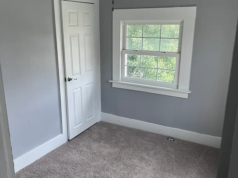 upstairs bedroom at top of steps