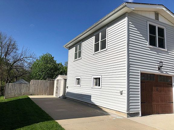 Storage Shed Behind Garage