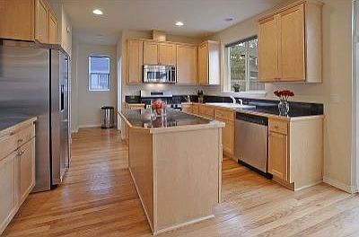 Immaculate- hardwood floors running from entry to the kitchen and eating areas