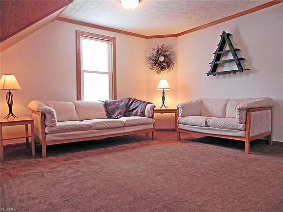 This elegant living room invites you in. Fresh paint throughout the house, newer carpeting will make your move easy.