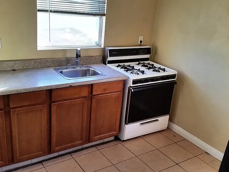 Kitchen with Fridge and Stove