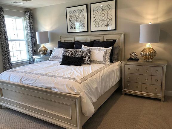 Master bedroom with king size bed.