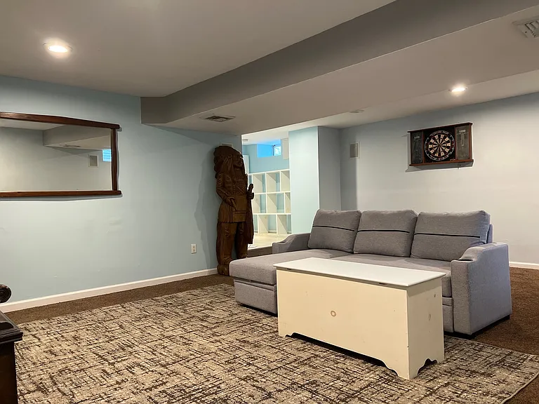 Angle of the living area. Wooden Indian must stay as it weighs 600 lbs.