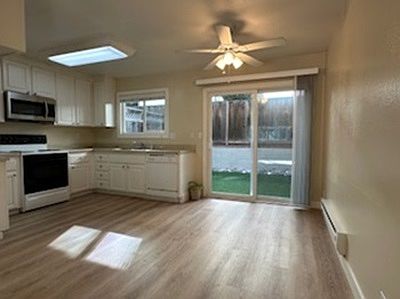 Photo of different unit to show new flooring in #4