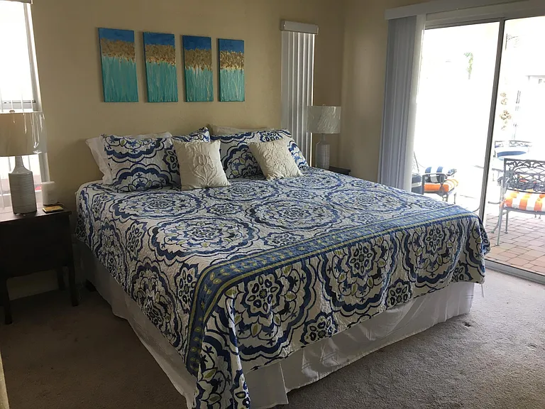 Master bedroom. New King memory foam bed. Slider opens to back patio.