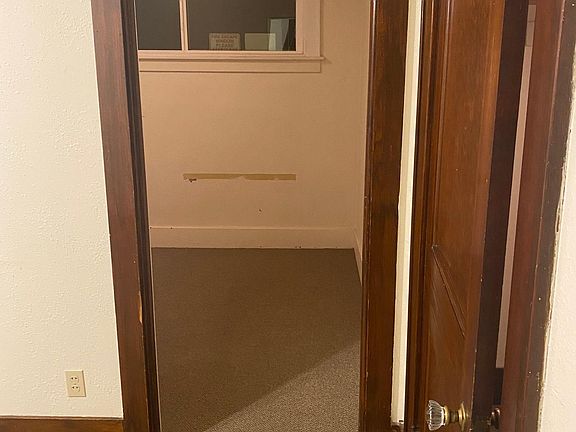 To right of entrance with view of bedroom and living room closet