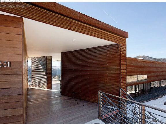 Exterior wrapped in rusted steel