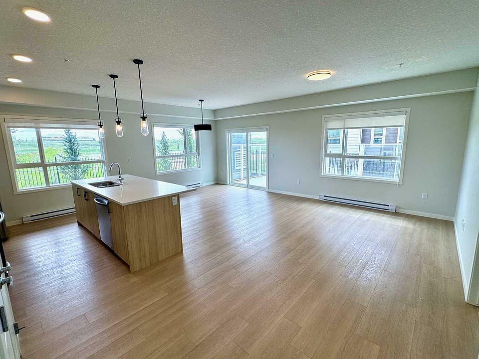 1st image of 102-360 Harvest Hills Way NE #102