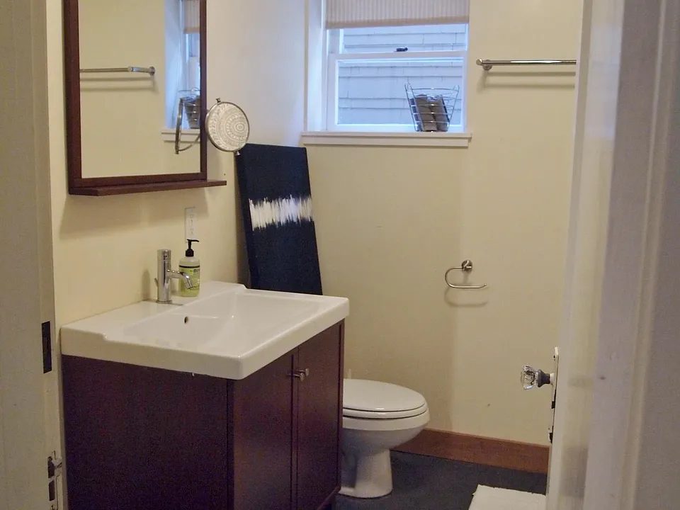 There is a full, private wather/dryer behind the bathroom door.