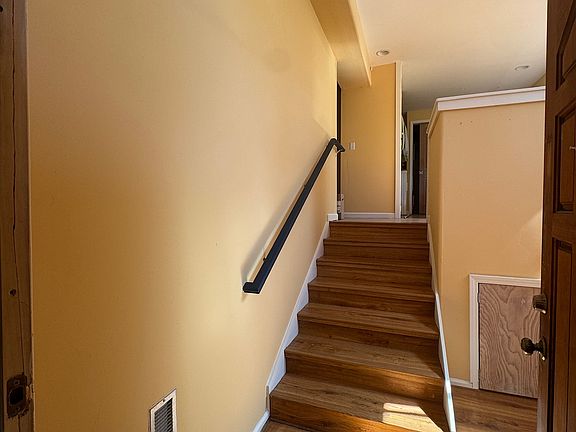 Entry way stairs to den