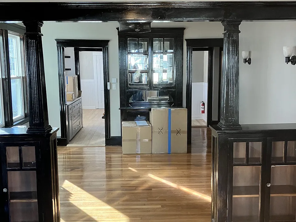 Living room looking into dining room.