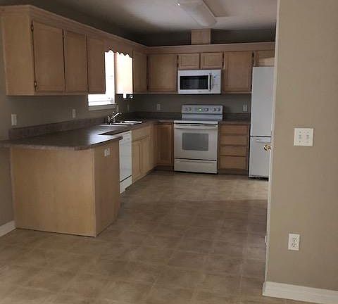 Kitchen area as viewed from dining area