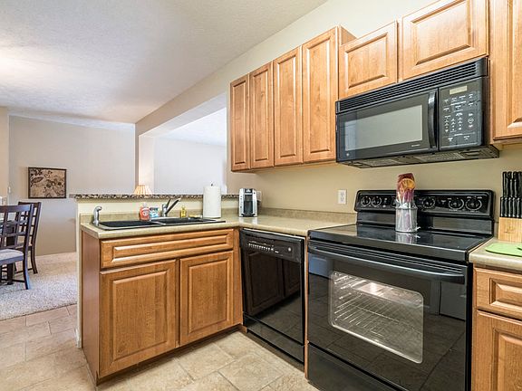 Cook like a pro with plenty of counter space, sleek appliances, and tons of cabinetry for all your kitchen essentials.