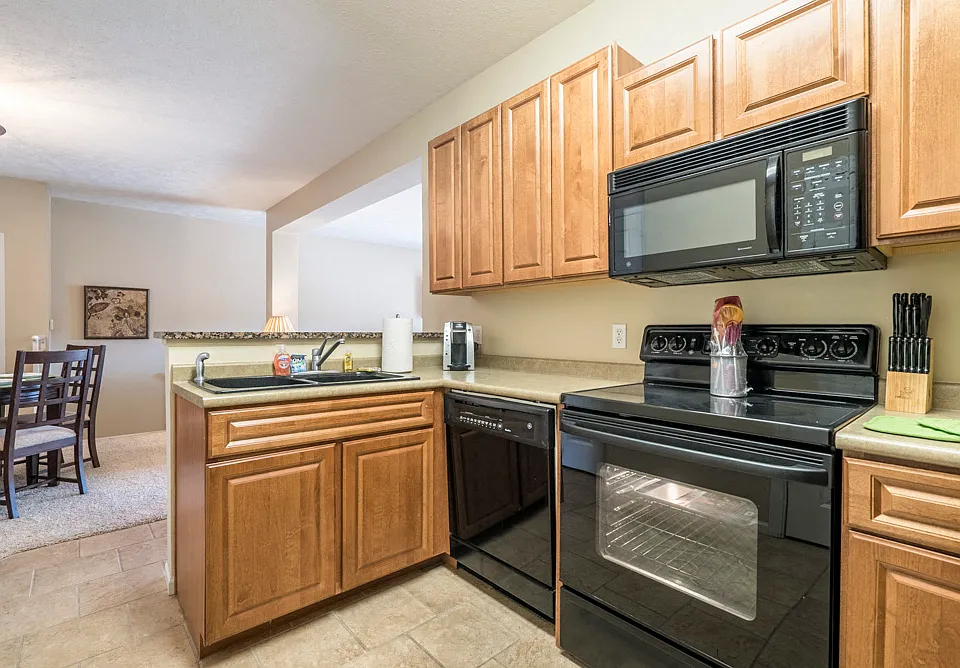 Cook like a pro with plenty of counter space, sleek appliances, and tons of cabinetry for all your kitchen essentials.