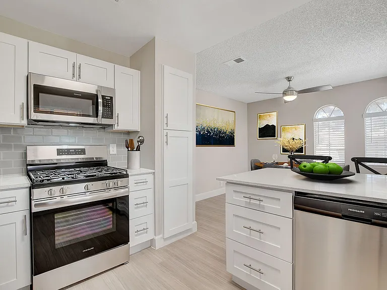 Step into modern living at Invitational, where sleek design meets comfort. Enjoy a stylish kitchen equipped with stainless steel appliances and an inviting layout perfect for entertaining. Don't miss outschedule a tour today!
