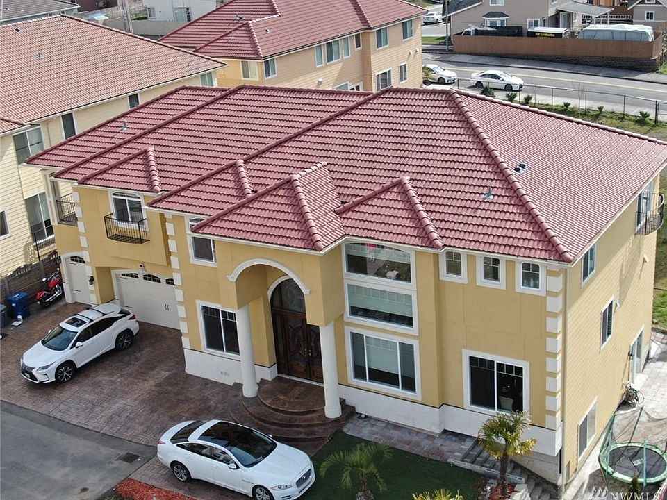 Elegant home: Stucco finish, extra large 9 feet double door entrance, 4 car driveway