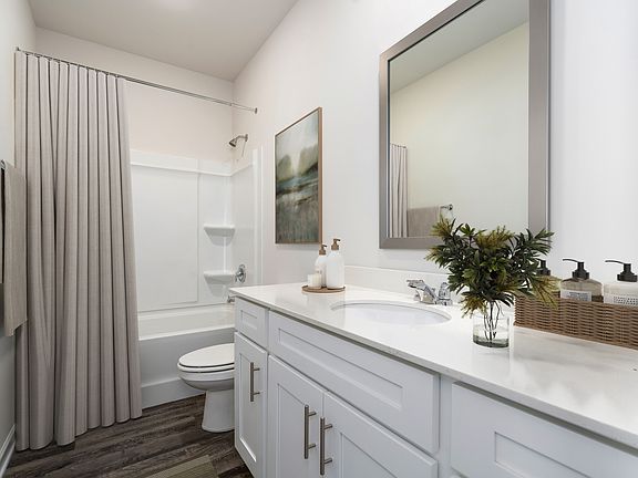 Get ready for the day in the master bathroom