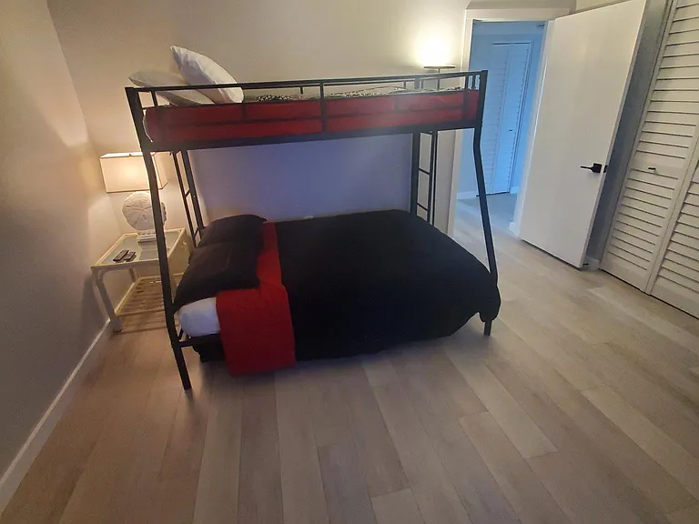 2nd bedroom. 3 beds. 1 full and 2 twin. 65' smart TV and large closets