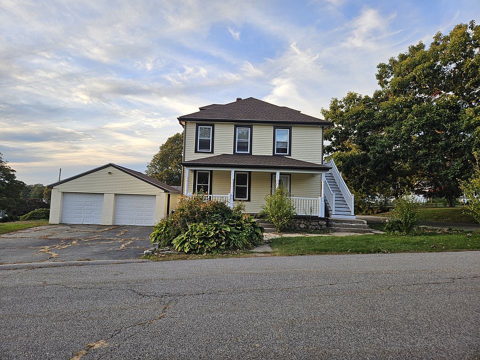 Front of house and driveway with two off street parking spaces.