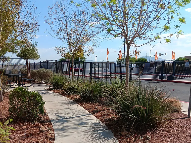 Bella Fiore's front gate and pathway to a picnic area.