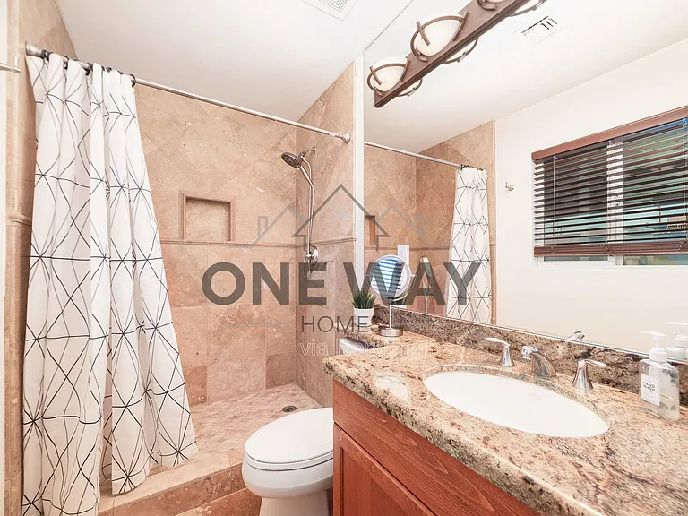 8702 E Sheridan St — Photo 6