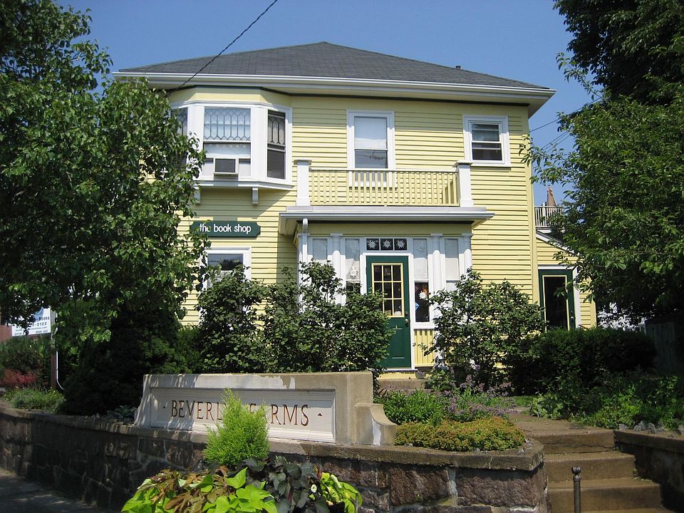 Charming Bookstore on first floor. Private access via green door to upstairs apartment.