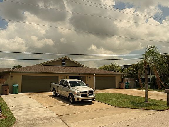 3 Car Wide driveway each sid