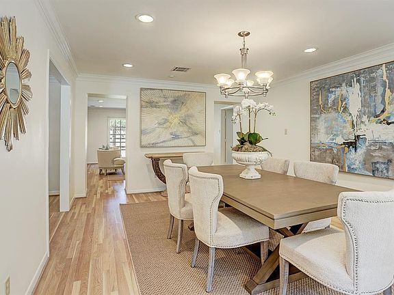 FORMAL: Dramatic formal dining room was once the formal living room. Note the double entry into the family room, crown molding, and the expansive spac