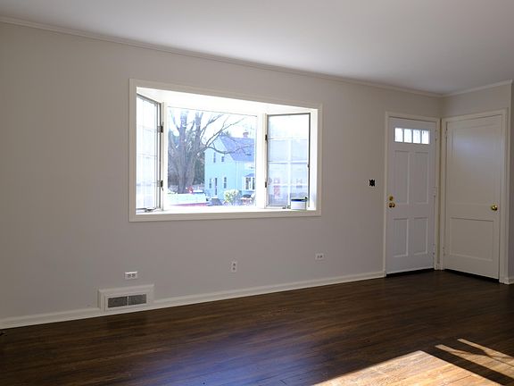 Living Room with large bay window southerly exposure.