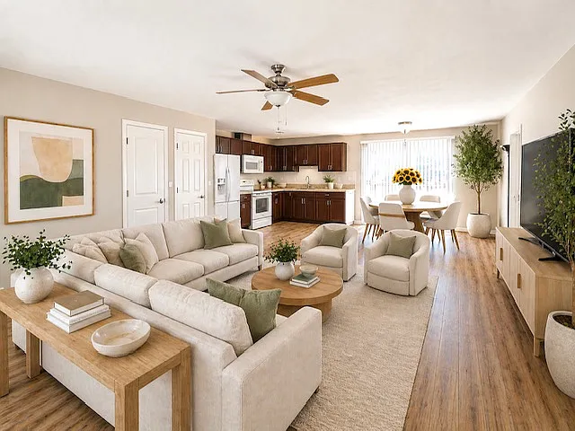 Open style living with patio doors leading out to deck and back yard.
Virtually staged. - 1851 Hanshaw Rd #B