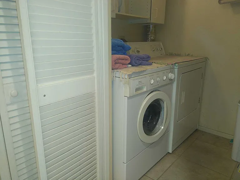 Laundry in walk in pantry adjacent to kitchen